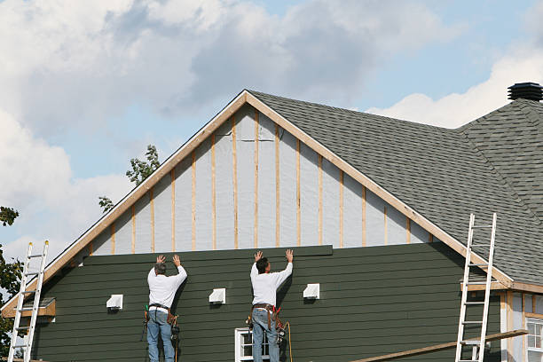 Professional Siding Installation technician working in Lexington, VA
